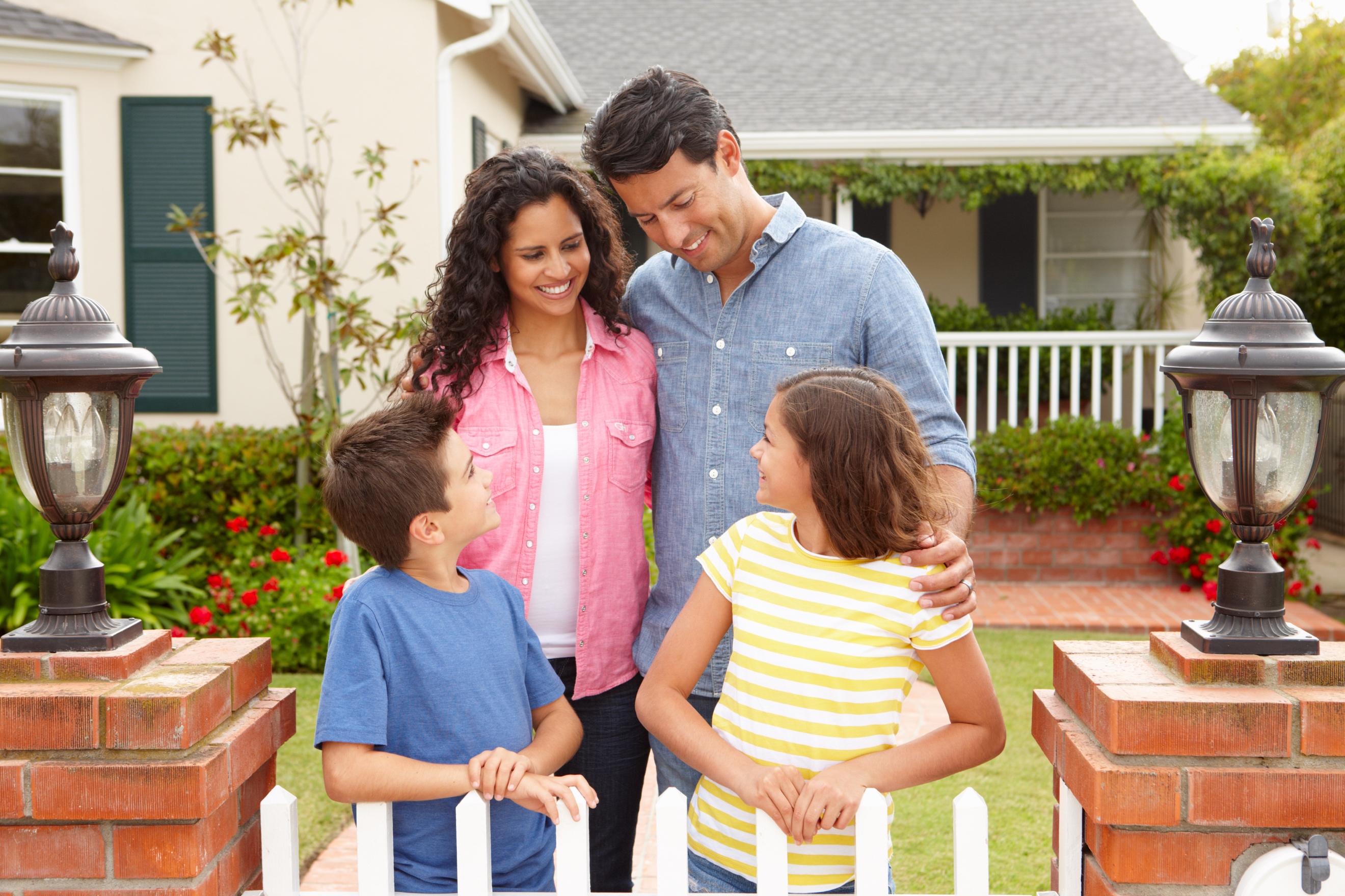 Family_in front of home.jpeg